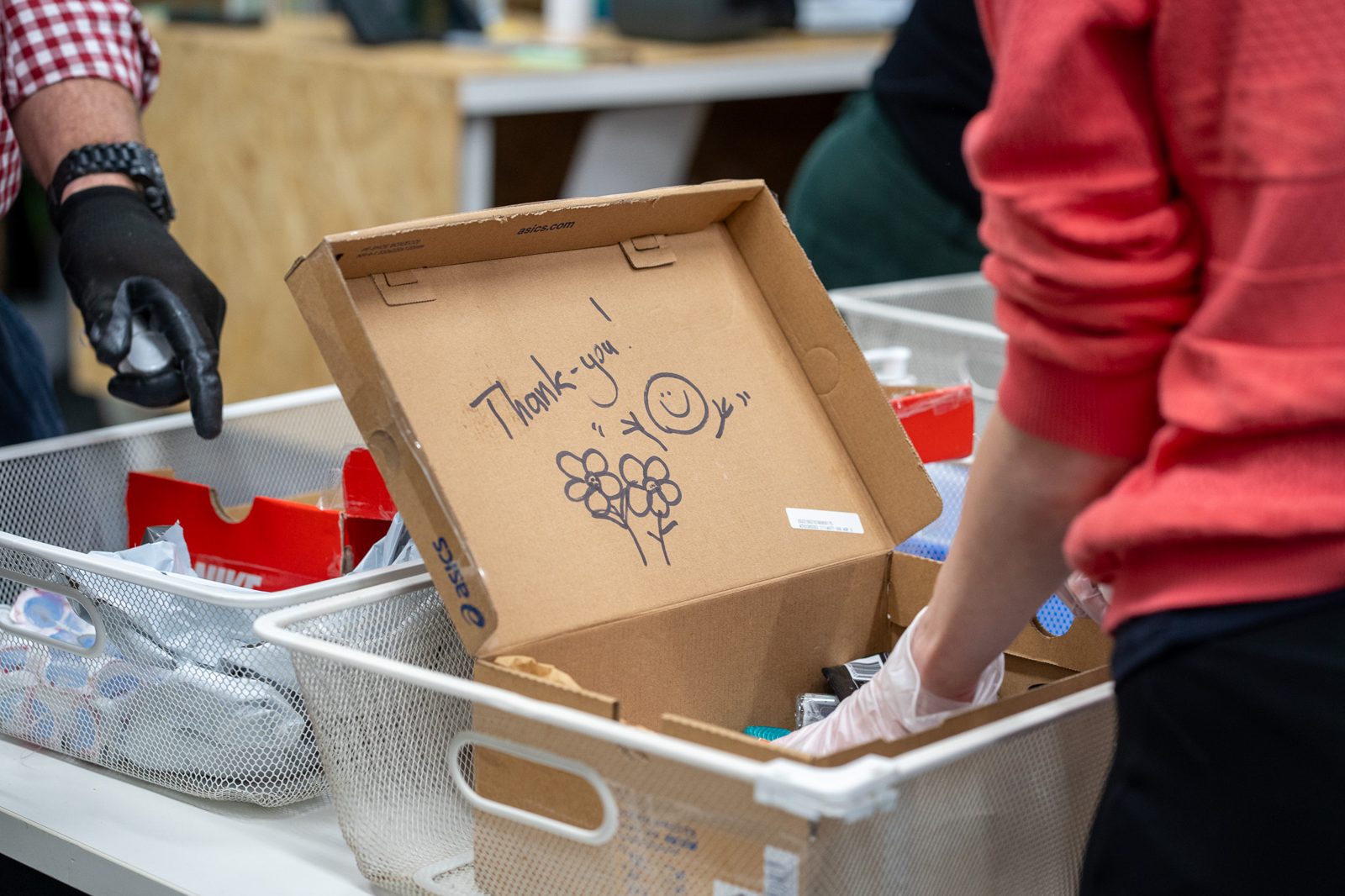 A hand-drawn thank-you note on a box at a BRAD session